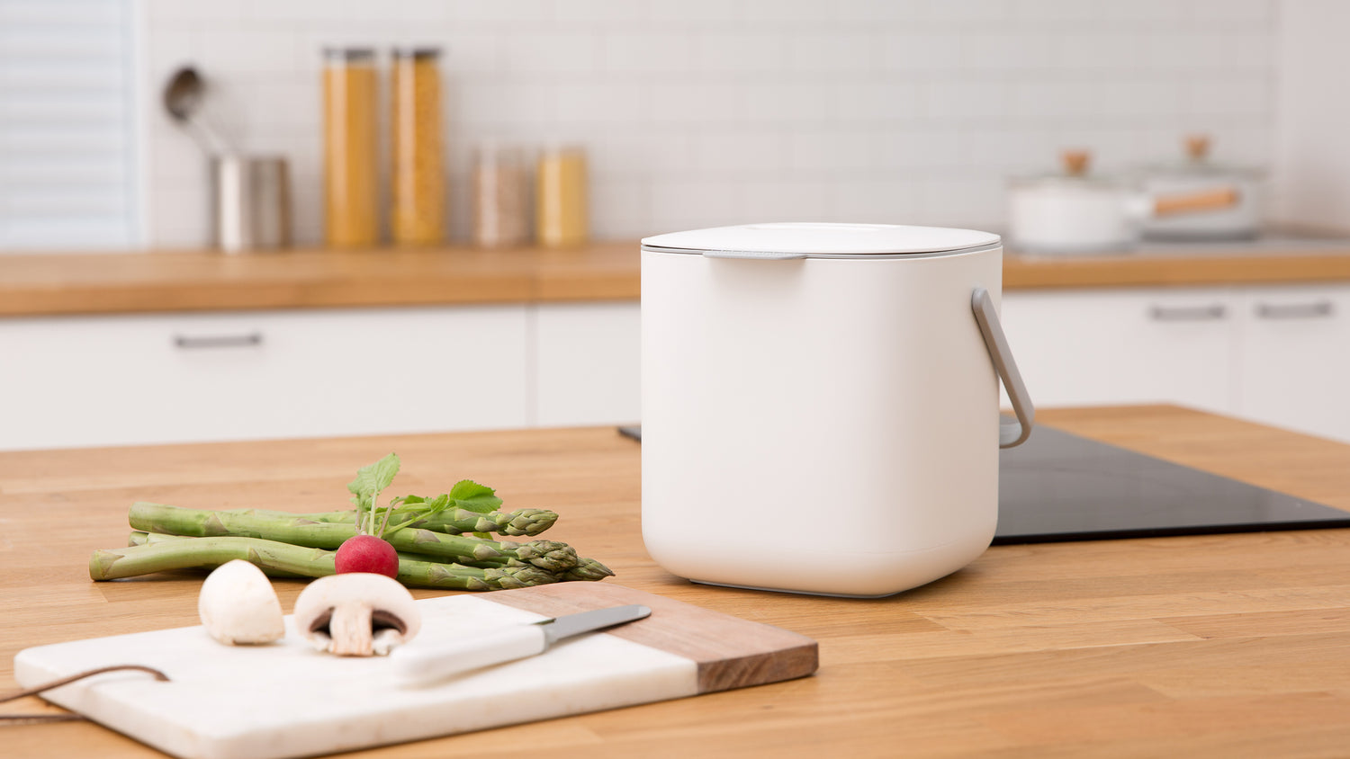 White Kitchen Food Waste Bin on a Countertop